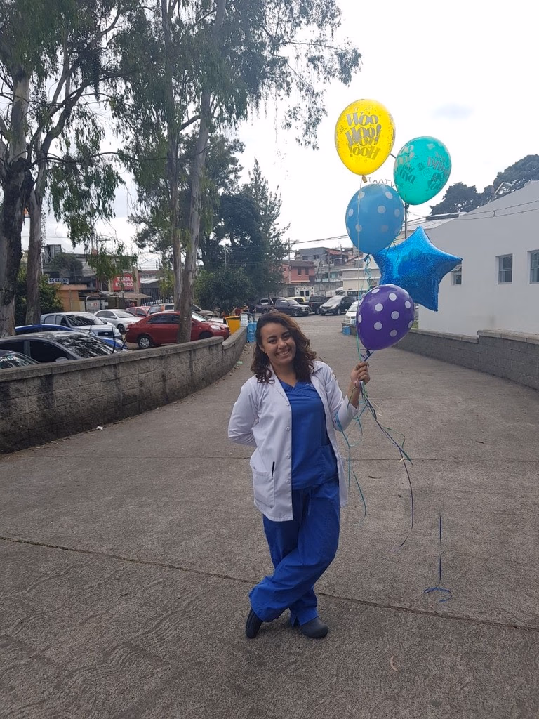 Dr. Padilla graduating from her Pediatric Master Degree